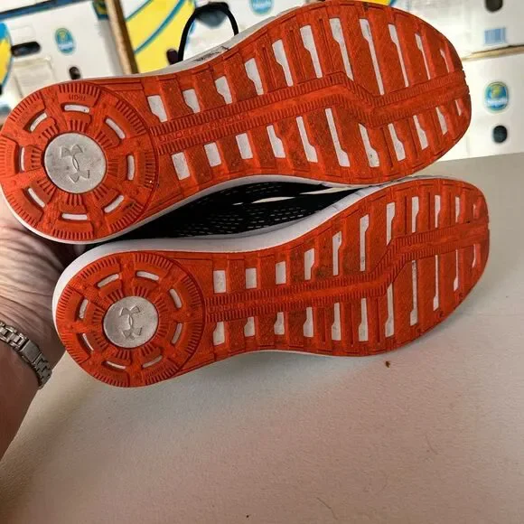 Under ArmourBlack and Orange Shoes